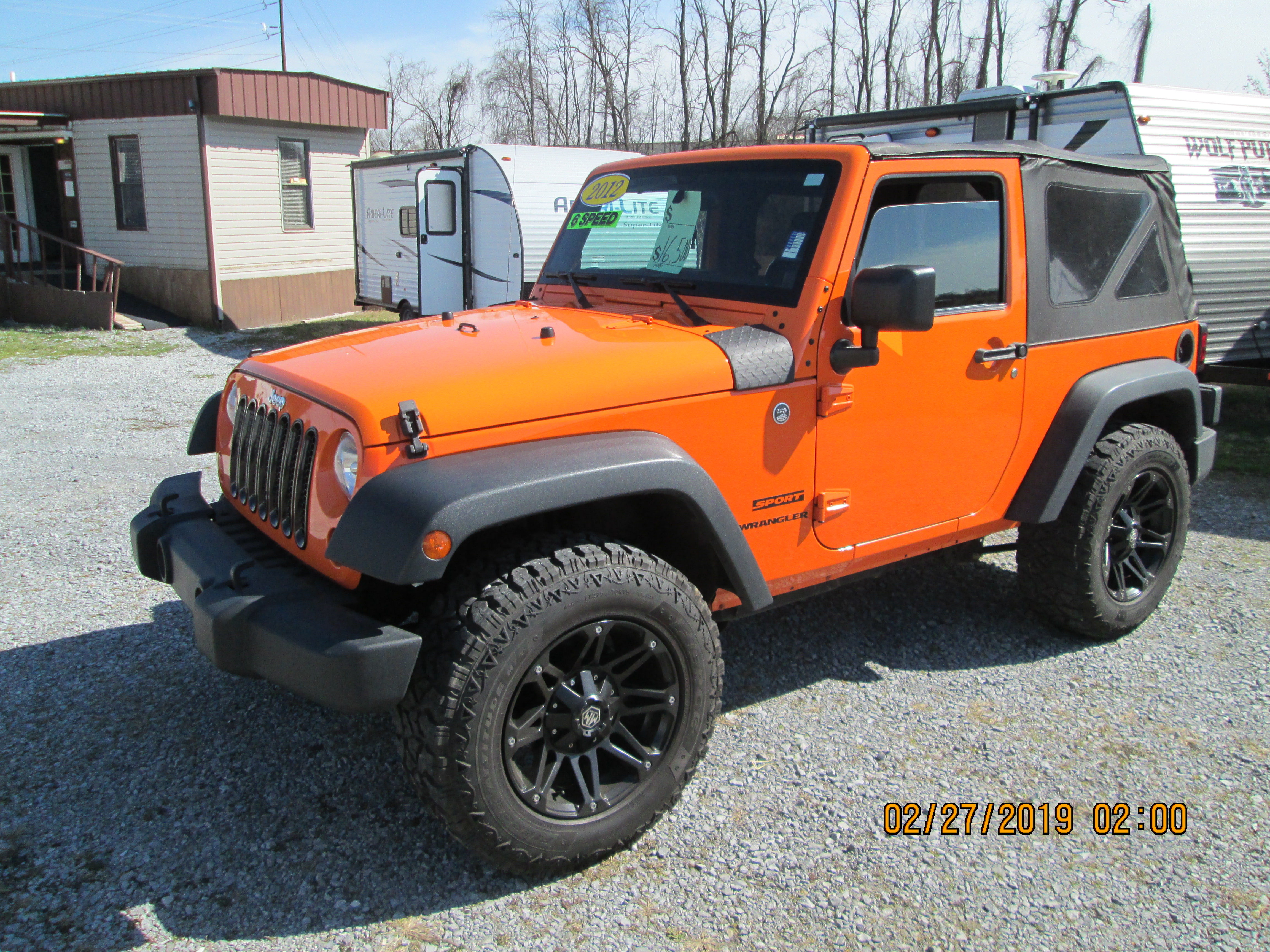 webassets/2012orangejeepfront.JPG