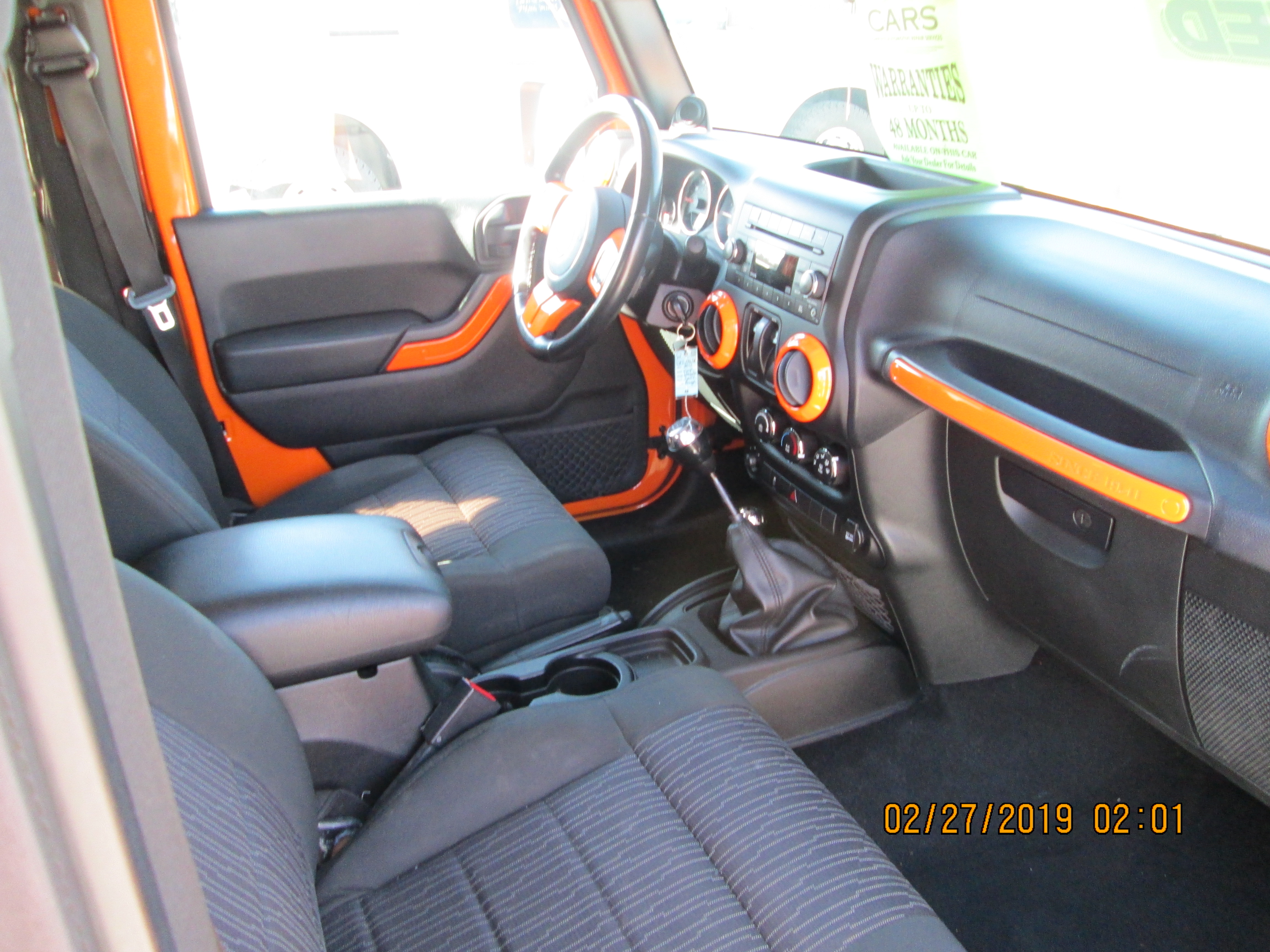 webassets/2012orangejeepseat.JPG